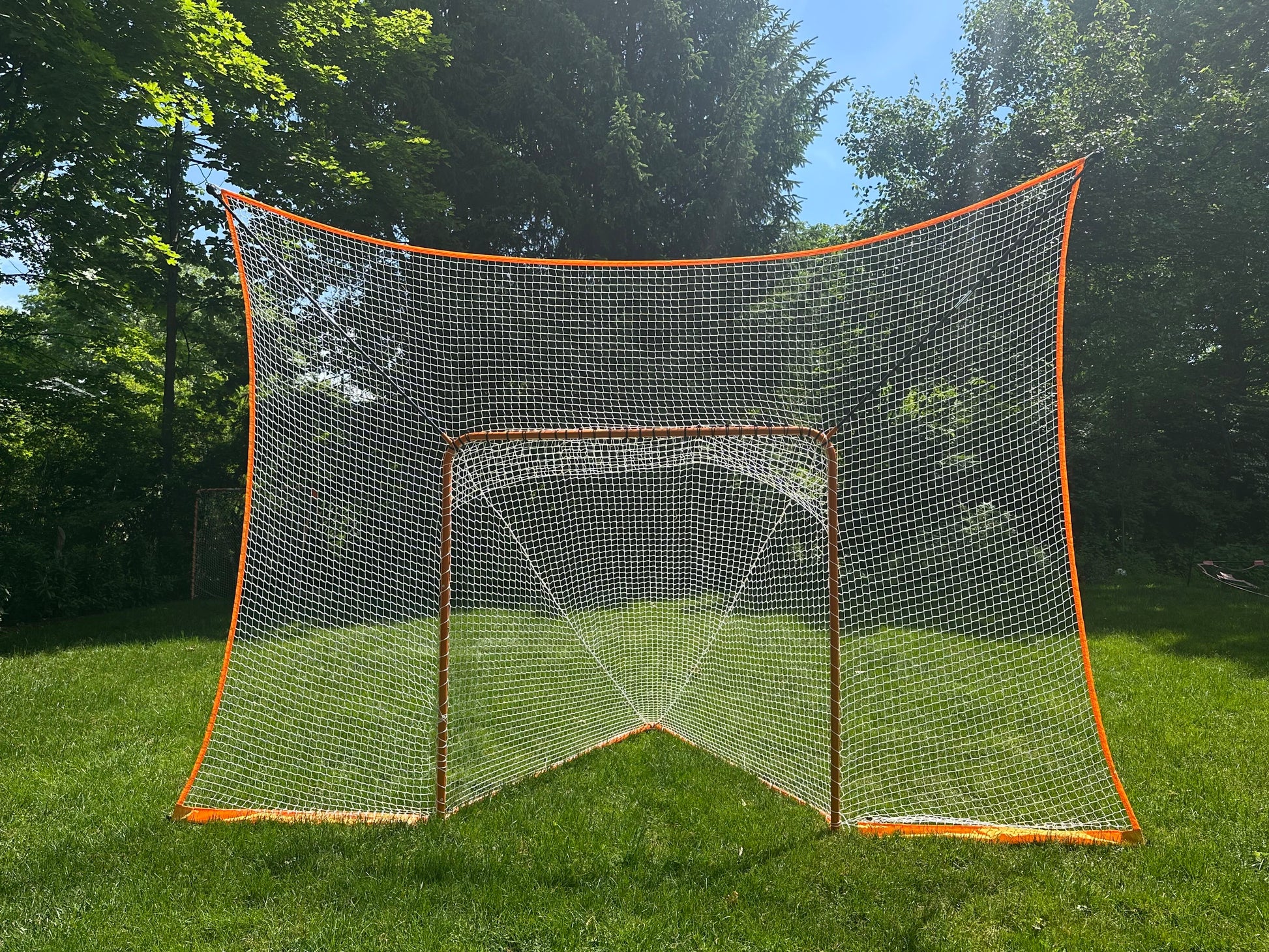 lacrosse goal net without removable black goal shield front view on grass