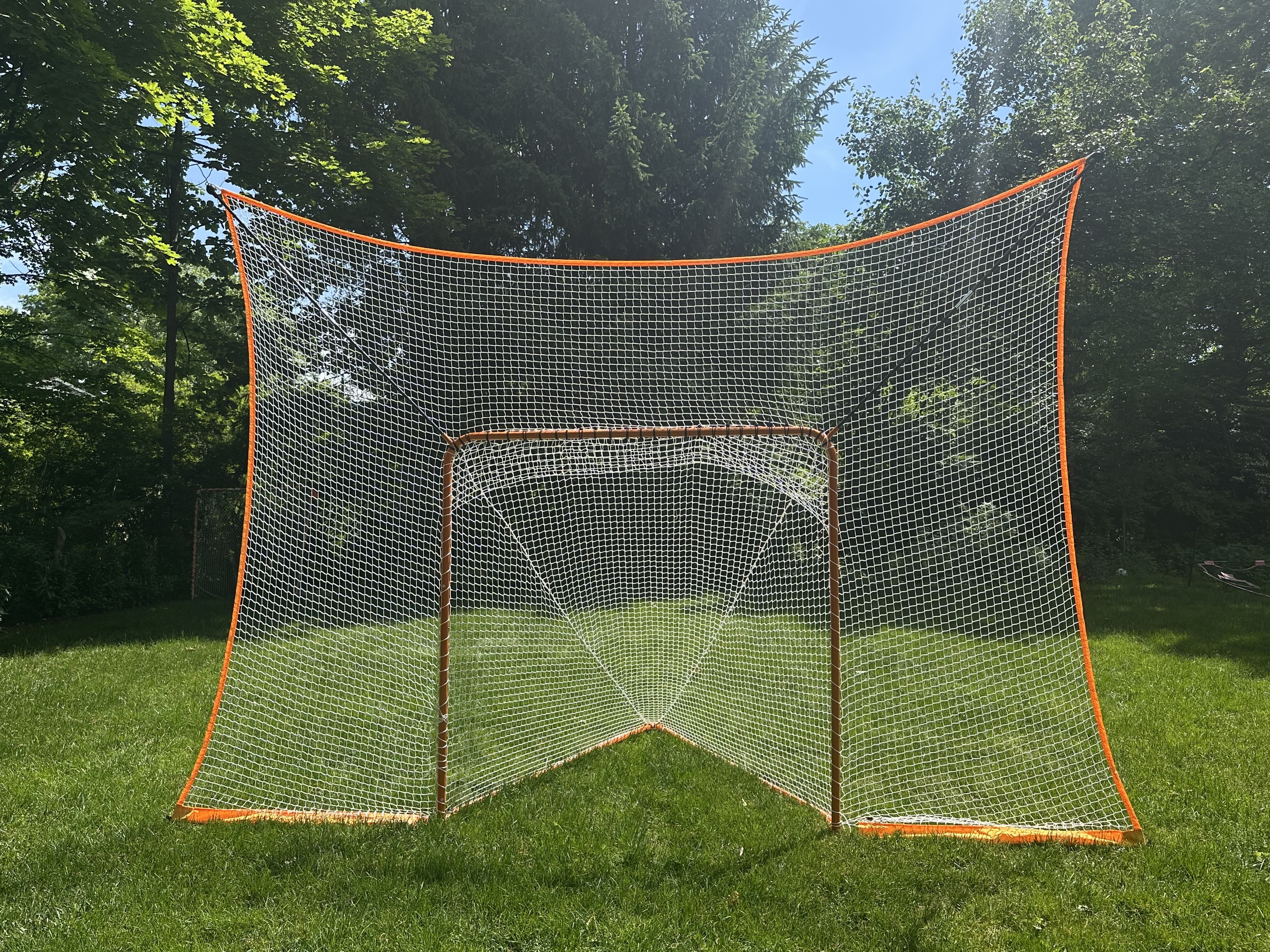lacrosse goal net without removable black goal shield front view on grass