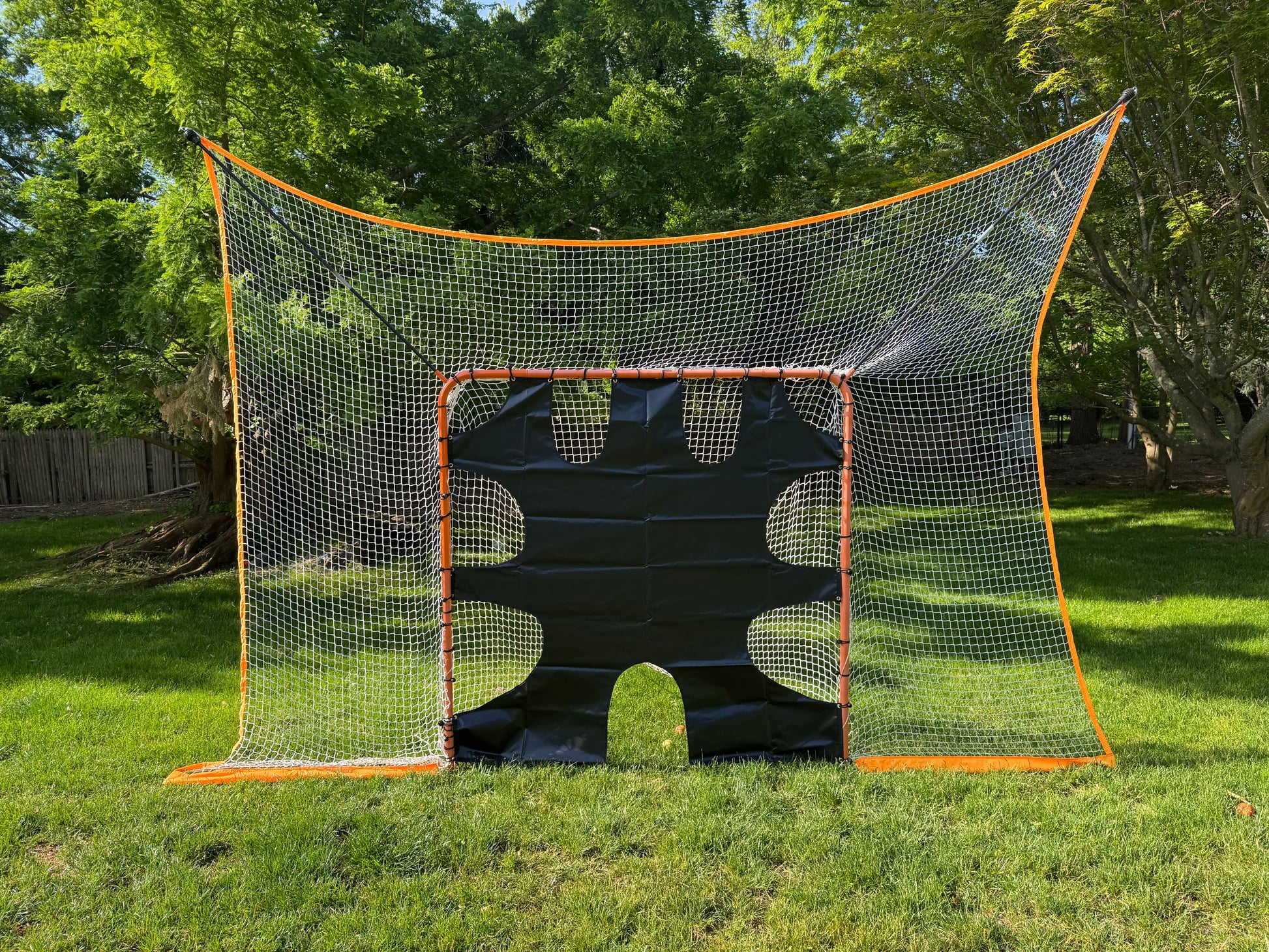 lacrosse goal net with removable black goal shield front view on grass