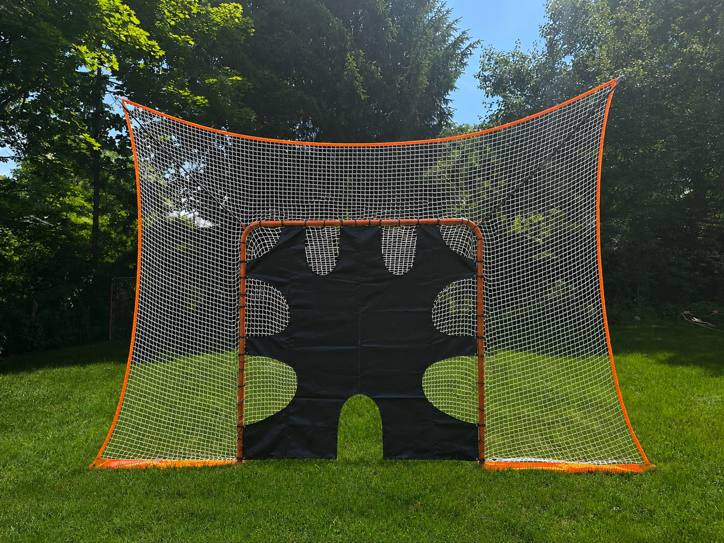 lacrosse goal net with removable black goal shield front view on grass